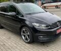Черный Фольксваген Туран, объемом двигателя 1.97 л и пробегом 230 тыс. км за 15999 $, фото 1 на Automoto.ua