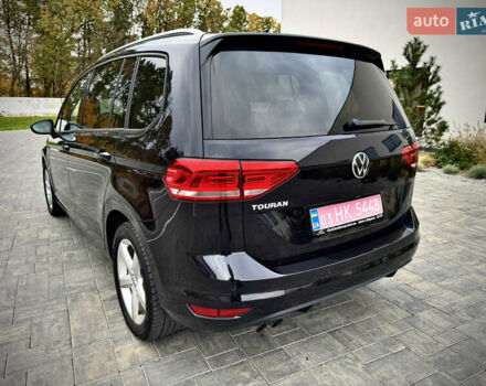 Черный Фольксваген Туран, объемом двигателя 1.97 л и пробегом 225 тыс. км за 17950 $, фото 2 на Automoto.ua
