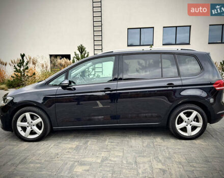 Черный Фольксваген Туран, объемом двигателя 1.97 л и пробегом 225 тыс. км за 17950 $, фото 1 на Automoto.ua