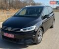 Черный Фольксваген Туран, объемом двигателя 2 л и пробегом 187 тыс. км за 20999 $, фото 1 на Automoto.ua