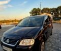 Черный Фольксваген Туран, объемом двигателя 1.6 л и пробегом 120 тыс. км за 6900 $, фото 1 на Automoto.ua