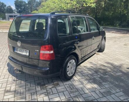 Черный Фольксваген Туран, объемом двигателя 1.6 л и пробегом 256 тыс. км за 4700 $, фото 4 на Automoto.ua