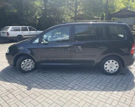 Черный Фольксваген Туран, объемом двигателя 1.6 л и пробегом 256 тыс. км за 4700 $, фото 2 на Automoto.ua