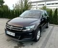 Черный Фольксваген Туран, объемом двигателя 2 л и пробегом 124 тыс. км за 11700 $, фото 1 на Automoto.ua