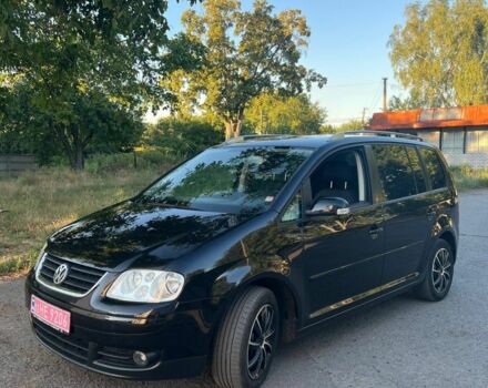 Чорний Фольксваген Туран, об'ємом двигуна 0 л та пробігом 170 тис. км за 6100 $, фото 1 на Automoto.ua