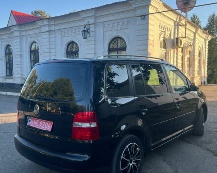 Чорний Фольксваген Туран, об'ємом двигуна 0 л та пробігом 170 тис. км за 6100 $, фото 2 на Automoto.ua