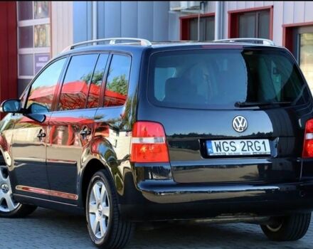 Черный Фольксваген Туран, объемом двигателя 1.9 л и пробегом 266 тыс. км за 2650 $, фото 2 на Automoto.ua