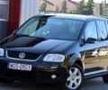 Черный Фольксваген Туран, объемом двигателя 1.9 л и пробегом 266 тыс. км за 2650 $, фото 1 на Automoto.ua