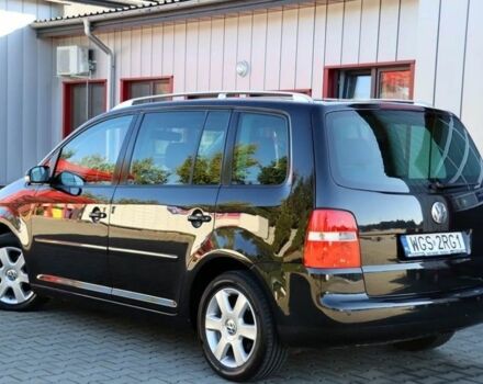 Черный Фольксваген Туран, объемом двигателя 1.9 л и пробегом 266 тыс. км за 2650 $, фото 3 на Automoto.ua