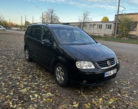 Чорний Фольксваген Туран, об'ємом двигуна 2 л та пробігом 245 тис. км за 3700 $, фото 2 на Automoto.ua