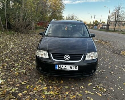 Чорний Фольксваген Туран, об'ємом двигуна 2 л та пробігом 245 тис. км за 3700 $, фото 1 на Automoto.ua