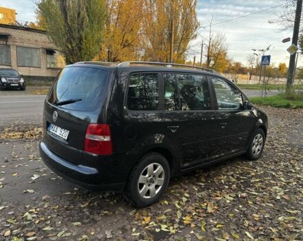 Чорний Фольксваген Туран, об'ємом двигуна 2 л та пробігом 245 тис. км за 3700 $, фото 4 на Automoto.ua