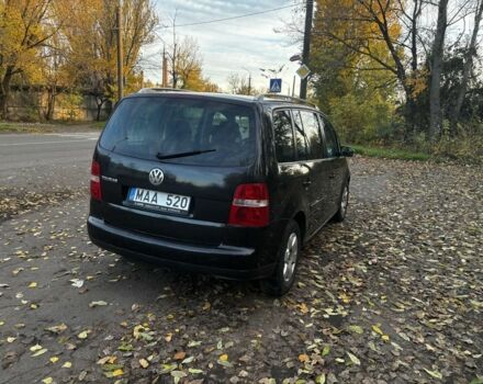 Чорний Фольксваген Туран, об'ємом двигуна 2 л та пробігом 245 тис. км за 3700 $, фото 5 на Automoto.ua