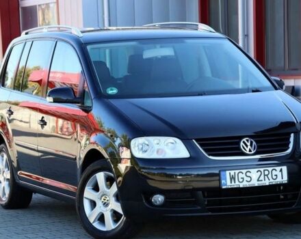 Черный Фольксваген Туран, объемом двигателя 1.9 л и пробегом 266 тыс. км за 2650 $, фото 1 на Automoto.ua