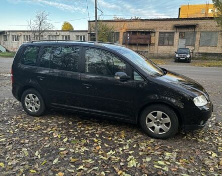 Чорний Фольксваген Туран, об'ємом двигуна 2 л та пробігом 245 тис. км за 3700 $, фото 3 на Automoto.ua