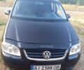 Чорний Фольксваген Туран, об'ємом двигуна 2 л та пробігом 3 тис. км за 4313 $, фото 1 на Automoto.ua