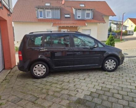 Черный Фольксваген Туран, объемом двигателя 2 л и пробегом 276 тыс. км за 2778 $, фото 1 на Automoto.ua