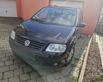 Чорний Фольксваген Туран, об'ємом двигуна 2 л та пробігом 280 тис. км за 3009 $, фото 1 на Automoto.ua