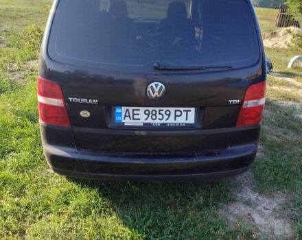 Черный Фольксваген Туран, объемом двигателя 1.9 л и пробегом 320 тыс. км за 2600 $, фото 1 на Automoto.ua