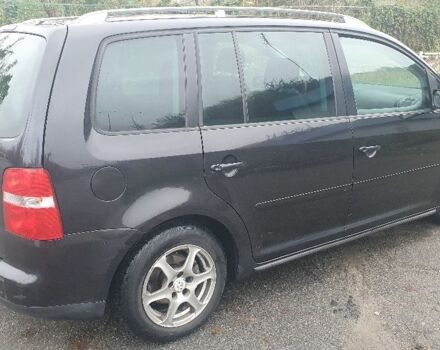 Черный Фольксваген Туран, объемом двигателя 1.9 л и пробегом 333 тыс. км за 3300 $, фото 2 на Automoto.ua