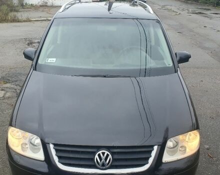 Черный Фольксваген Туран, объемом двигателя 1.9 л и пробегом 333 тыс. км за 3300 $, фото 4 на Automoto.ua