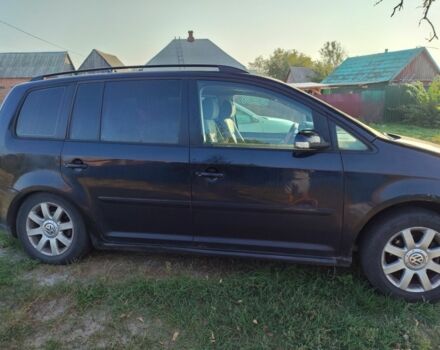 Черный Фольксваген Туран, объемом двигателя 1.9 л и пробегом 320 тыс. км за 2600 $, фото 2 на Automoto.ua