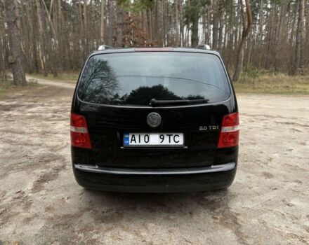 Чорний Фольксваген Туран, об'ємом двигуна 2 л та пробігом 328 тис. км за 2999 $, фото 5 на Automoto.ua