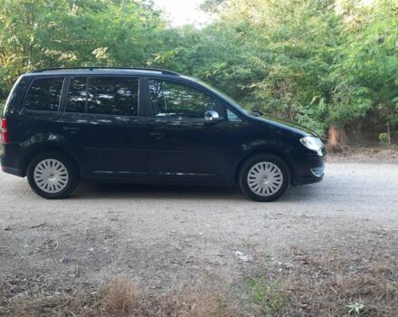 Черный Фольксваген Туран, объемом двигателя 1.6 л и пробегом 138 тыс. км за 7175 $, фото 2 на Automoto.ua