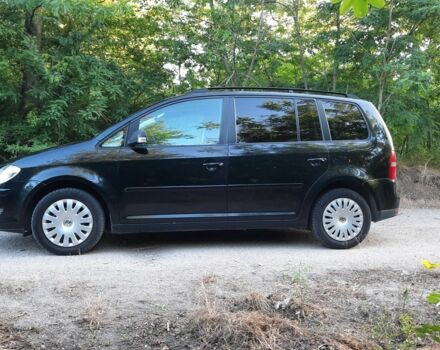 Черный Фольксваген Туран, объемом двигателя 1.6 л и пробегом 138 тыс. км за 7175 $, фото 5 на Automoto.ua