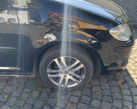 Черный Фольксваген Туран, объемом двигателя 1.9 л и пробегом 270 тыс. км за 6309 $, фото 4 на Automoto.ua