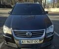 Чорний Фольксваген Туран, об'ємом двигуна 1.4 л та пробігом 250 тис. км за 7500 $, фото 1 на Automoto.ua