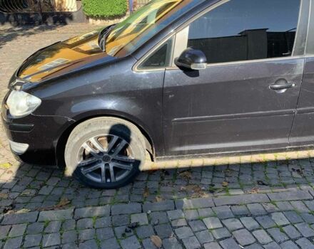 Черный Фольксваген Туран, объемом двигателя 1.9 л и пробегом 270 тыс. км за 6309 $, фото 1 на Automoto.ua