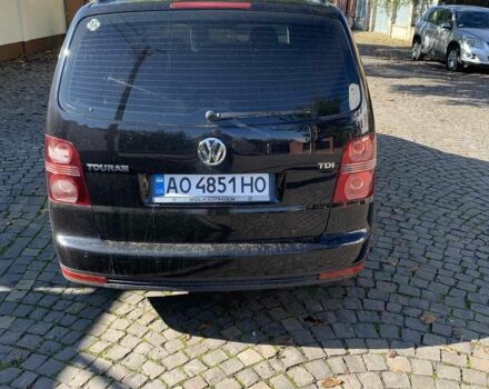 Черный Фольксваген Туран, объемом двигателя 1.9 л и пробегом 270 тыс. км за 6309 $, фото 6 на Automoto.ua