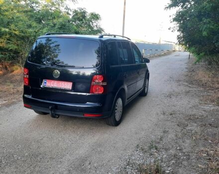 Черный Фольксваген Туран, объемом двигателя 1.6 л и пробегом 138 тыс. км за 7175 $, фото 3 на Automoto.ua