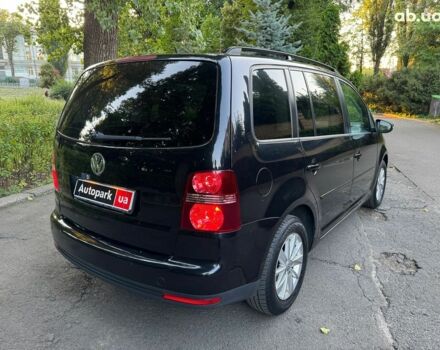Чорний Фольксваген Туран, об'ємом двигуна 1.4 л та пробігом 260 тис. км за 7790 $, фото 4 на Automoto.ua