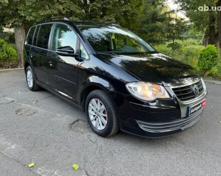 Чорний Фольксваген Туран, об'ємом двигуна 1.4 л та пробігом 260 тис. км за 7790 $, фото 2 на Automoto.ua