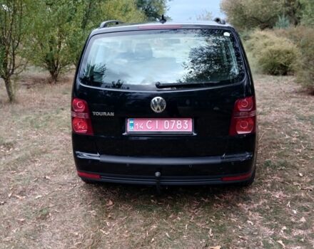 Черный Фольксваген Туран, объемом двигателя 1.6 л и пробегом 248 тыс. км за 8299 $, фото 7 на Automoto.ua