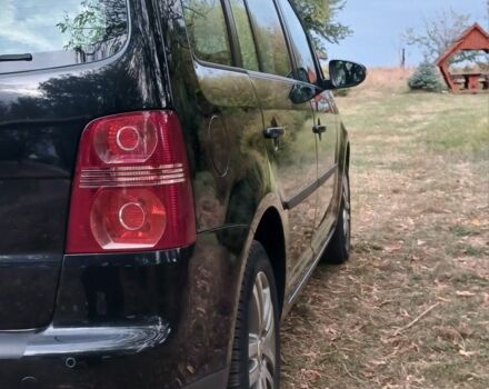 Черный Фольксваген Туран, объемом двигателя 1.6 л и пробегом 248 тыс. км за 8299 $, фото 10 на Automoto.ua