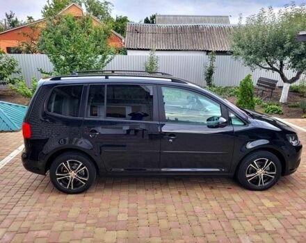 Черный Фольксваген Туран, объемом двигателя 1.6 л и пробегом 204 тыс. км за 11950 $, фото 5 на Automoto.ua