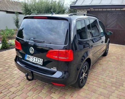 Черный Фольксваген Туран, объемом двигателя 1.6 л и пробегом 204 тыс. км за 11950 $, фото 4 на Automoto.ua