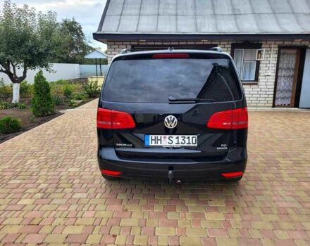 Черный Фольксваген Туран, объемом двигателя 1.6 л и пробегом 204 тыс. км за 11950 $, фото 3 на Automoto.ua