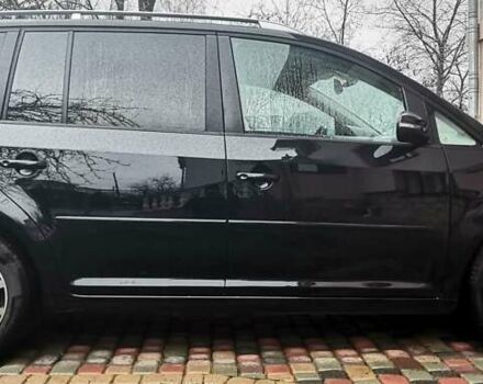 Черный Фольксваген Туран, объемом двигателя 1.6 л и пробегом 211 тыс. км за 12950 $, фото 7 на Automoto.ua