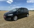 Черный Фольксваген Туран, объемом двигателя 2 л и пробегом 180 тыс. км за 22200 $, фото 1 на Automoto.ua