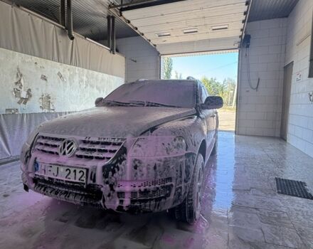 Черный Фольксваген Туран, объемом двигателя 2.5 л и пробегом 318 тыс. км за 4800 $, фото 1 на Automoto.ua