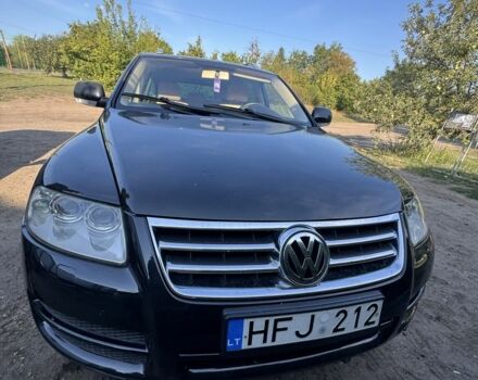 Черный Фольксваген Туран, объемом двигателя 2.5 л и пробегом 318 тыс. км за 4800 $, фото 2 на Automoto.ua