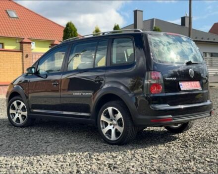 Черный Фольксваген Туран, объемом двигателя 1.4 л и пробегом 220 тыс. км за 7500 $, фото 4 на Automoto.ua