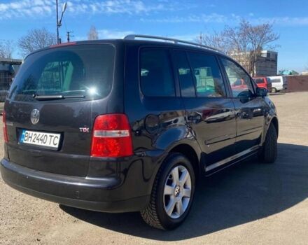 Черный Фольксваген Туран, объемом двигателя 2 л и пробегом 3 тыс. км за 5500 $, фото 5 на Automoto.ua