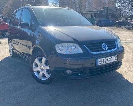 Черный Фольксваген Туран, объемом двигателя 2 л и пробегом 3 тыс. км за 5500 $, фото 1 на Automoto.ua