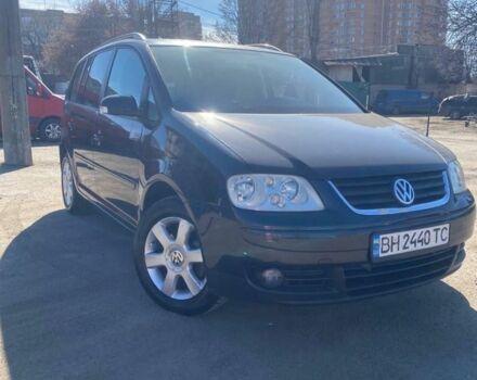 Черный Фольксваген Туран, объемом двигателя 2 л и пробегом 3 тыс. км за 5500 $, фото 2 на Automoto.ua