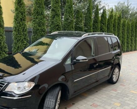Чорний Фольксваген Туран, об'ємом двигуна 2 л та пробігом 205 тис. км за 7800 $, фото 4 на Automoto.ua